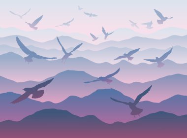 Dağların üzerinden uçan kuş silhouettes