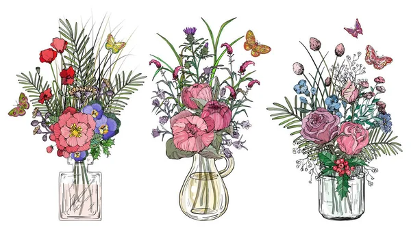 Cam vazolarda bir buket çiçek.