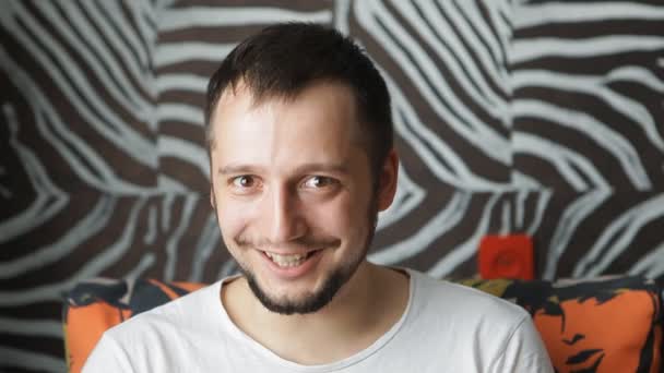 Close-up portrait of a young happy man — Stock Video