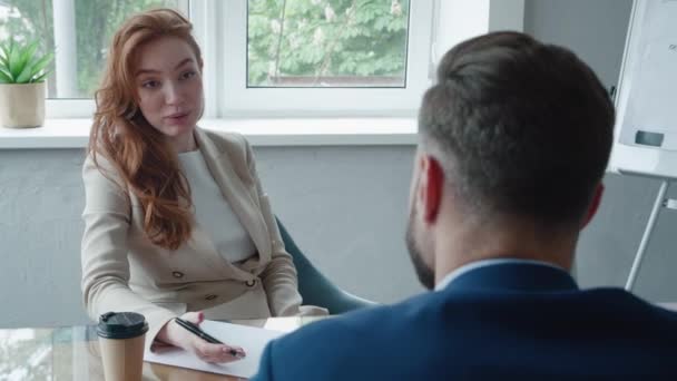 Businesswoman Interviewing Male Job Candidate In Meeting Room. Job HR applicants having an interview with Human resource manager jobs interviewing with confident candidate at business firm office. — Stock Video