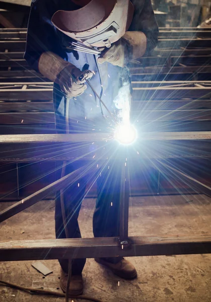 When the factory welders work a dazzling light