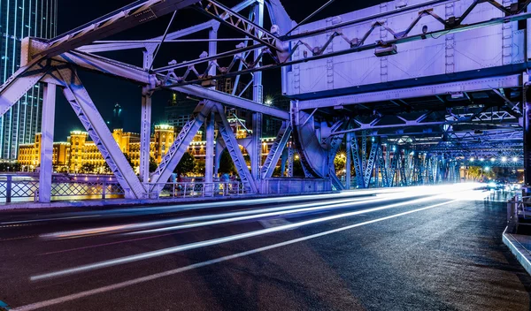 Night traffic lights inside of the Garden Bridge of shanghai china.