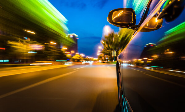 View from Side of Car Going Around Corner, Blurred Motion