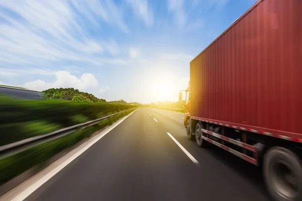 Truck on a fast express road, motion blur — Stock Photo, Image