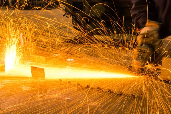 Sparks while grinding iron — Stock Photo, Image