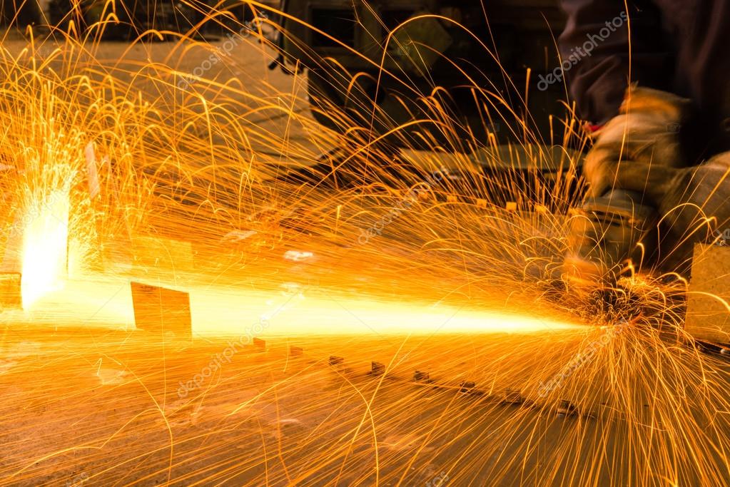 Sparks while grinding iron — Stock Photo © fanjianhua 88768692