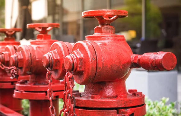 Linii red fire hydrant — Zdjęcie stockowe