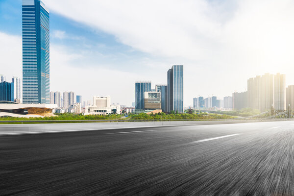 The city and the road in the modern office building background