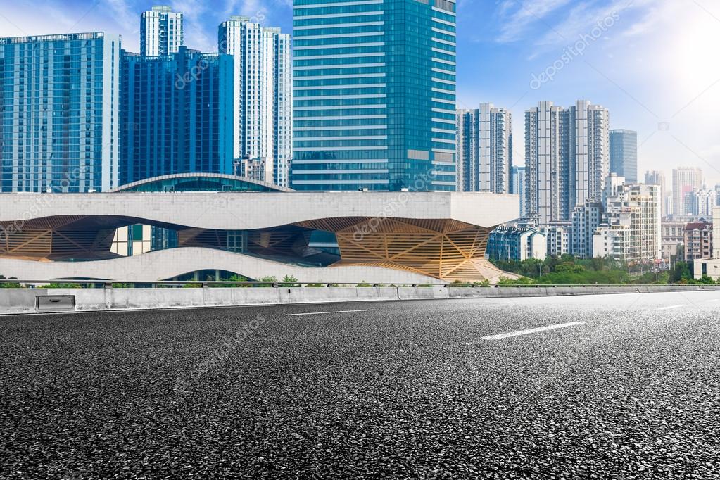 The city and the road in the modern office building background Stock Photo  by ©fanjianhua 92539402