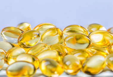 balık yağ yağ kapsül arka plan.