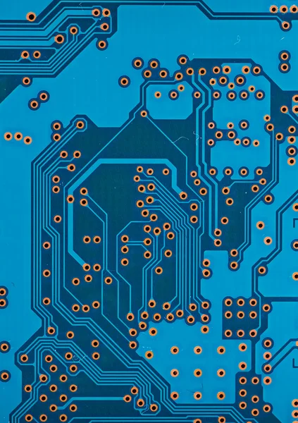 コンピュータマザーボードの青い回路基板の背景 — ストック写真