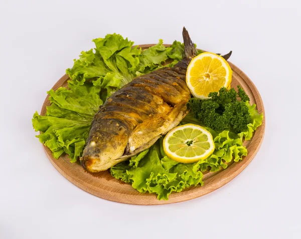 Stekt fisk med färska örter och citron — Stockfoto