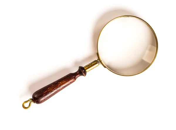 Photo of a Brass Magnifying Glass with wooden handle — Stock Photo, Image