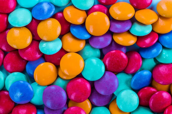 Close-up van kleurrijke snoepjes als structuur — Stockfoto