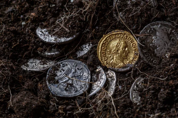 A treasure of Roman gold and silver coins.Trajan Decius. AD 249-251. AV Aureus.Ancient coin of the Roman Empire.Authentic  silver denarius, antoninianus,aureus of ancient Rome.Antikvariat.