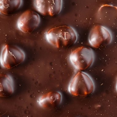 Fındıklı çikolata arkaplanı. Tatlı yemek fotokonsepti. Lezzetli tatlı. Popüler tatlılar.