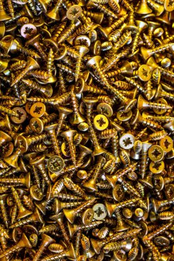 Sürgüler ve fındıklar. Çeşitli vidaları yakın çekim. Arkaplan ve üst görünüm için kullan.