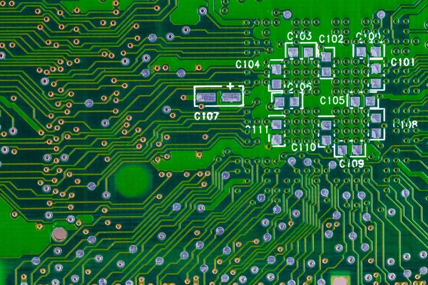 Fechar de uma placa de circuito de computador verde impressa — Fotografia de Stock