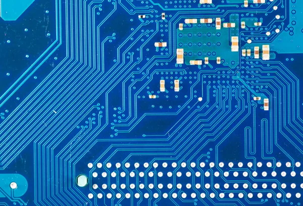 Blue circuit board background of computer motherboard close up — Stock Photo, Image