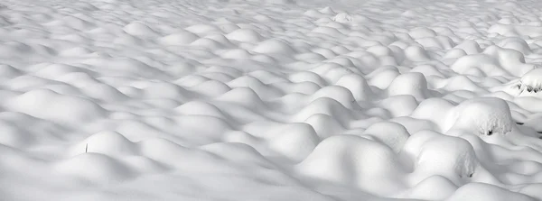 Snö kullar efter blizzard — Stockfoto
