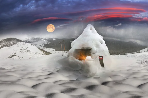 Byggandet av huset och klättring snön grottor. — Stockfoto