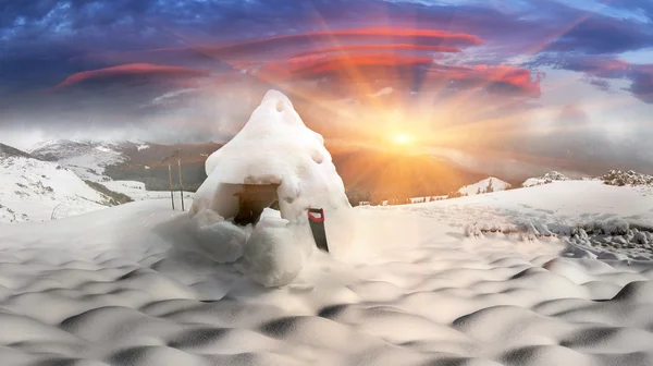 Byggandet av huset och klättring snön grottor. — Stockfoto