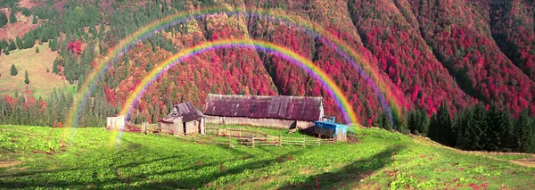 Autumn on pasture with shepherds houses — Stock Photo, Image