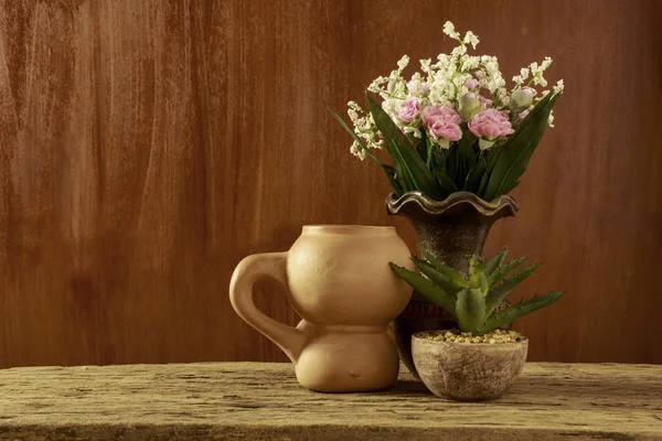 Flowers and Earthenware in Still life Style
