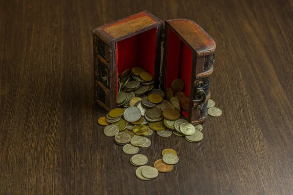 Treasure chest with old russian coin and have a wood floor in the background — Stock Photo, Image