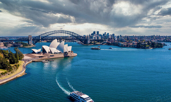 June 20, 2020. Sydney, Australia. Beautiful aerial view of the Sydney city from above with Harbour bridge, Opera house and the harbour.