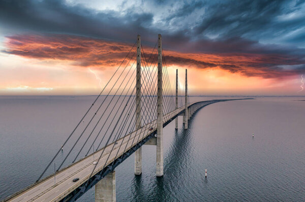 The bridge between Denmark and Sweden, Oresundsbron. Aerial view of the bridge during cloudy stormy weather.