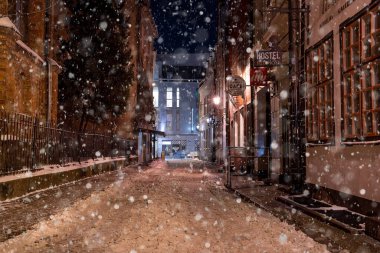 February 10, 2021. Riga, Latvia. Beautiful winter night in the old town of Riga, Latvia. View of the narrow Riga streets.