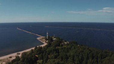 Aerial view of the lighthouse and mole at river Daugava in Latvia.