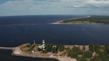Aerial view of the lighthouse and mole at river Daugava in Latvia.