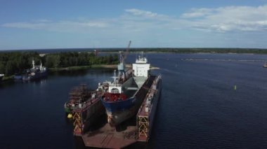 Industry view - The dry dock in shipyard aerial view. 