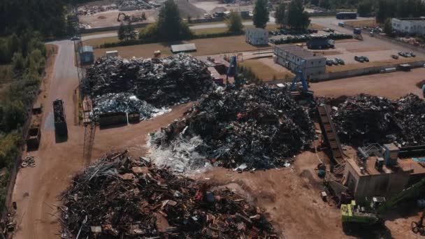 Old wrecked cars in junkyard waiting to be shredded in a recycling park — Stok video