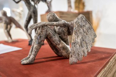 Paper angel sculpture. Beautiful typography 3D example.