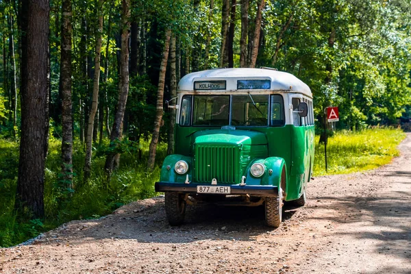 Vintage Soviet bus models exhibited in a yard — Foto de Stock