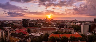Panoramic view of Old Tallinn city at purple sunset, Estonia.