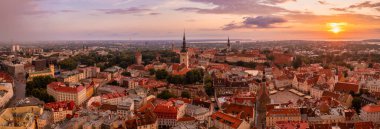 Panoramic view of Old Tallinn city at purple sunset, Estonia.
