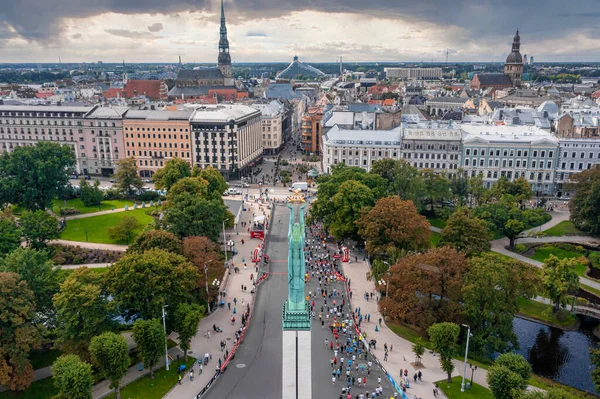 Gente corriendo la Maratón Internacional de Rimi Riga —  Fotos de Stock