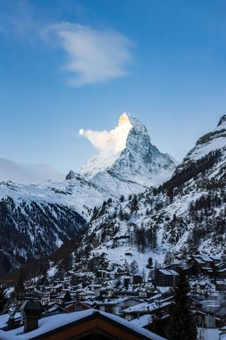 Beautiful Matterhorn mountain peak during sunny winter morning in Zermatt, Switzerland. Scenic view of snowcapped matterhorn mountain peak.