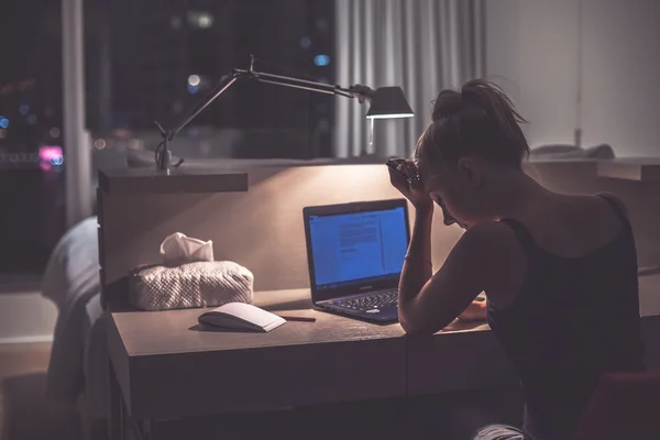 Young woman having headache