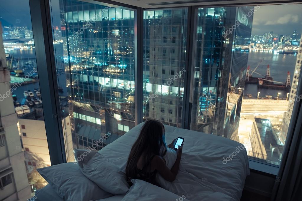 Woman Using Smartphone In The Bed At Night Stock Photo By C Fulltimegypsy