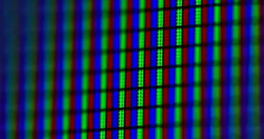 LCD ekranının soyut arkaplanı. Bilgisayar monitörü RGB piksellerini kapatın. Kırmızı kamerada görüntülendi..