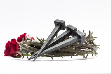 Jesus Christ crown of thorns, nails and two roses. clipart