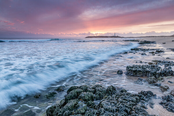 Закат на пляже Трафалгар
