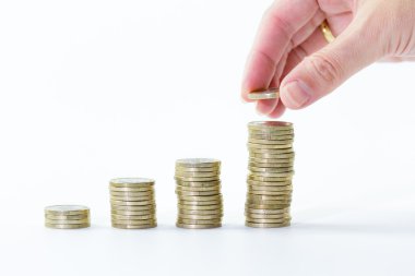 El yığın bir euro sikke sütun artan içine yakın çekim