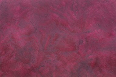 Mor, pembe grunge dokulu duvar.