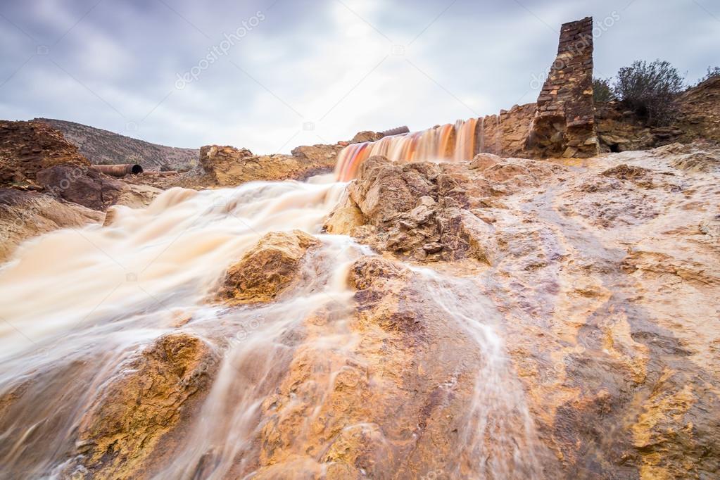 Waterfall in Riotinto mining area, Andalusia, Spain